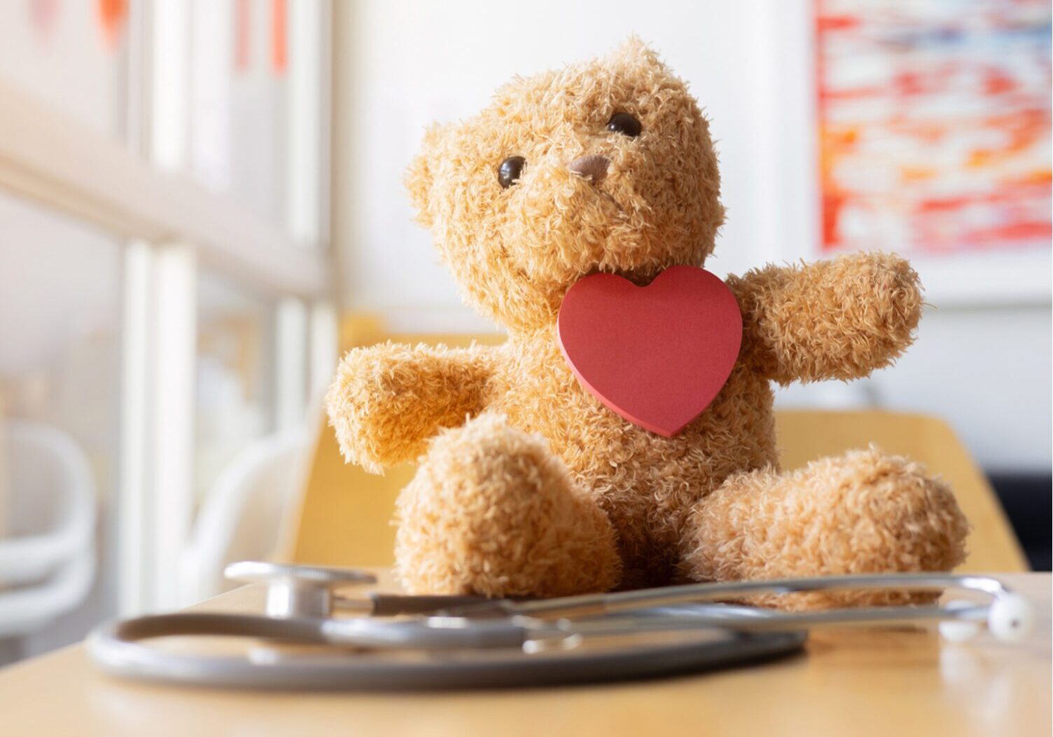Teddy bear with heart and stethoscope.